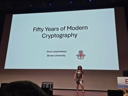 A photo of Anna Lysyanskaya giving her talk